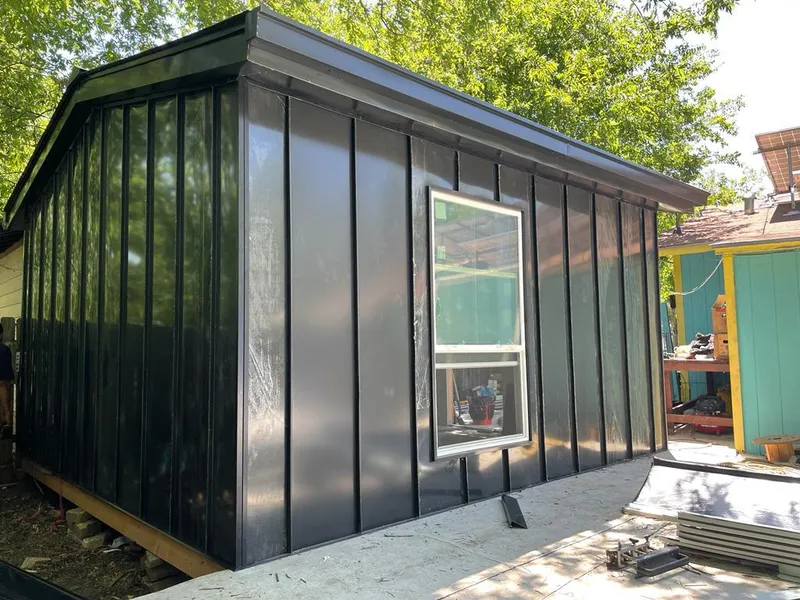 Black standing seam metal wall panels for Roof Inspection in Gleneagle