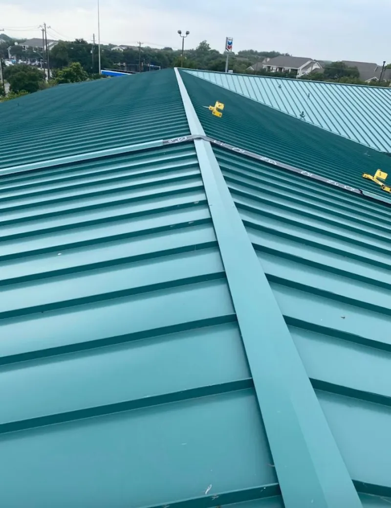 Green commercial metal roof ridge and valley for Metal Roof Repair in Gleneagle